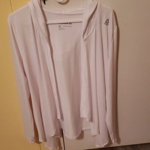 White Reebok , light sweater